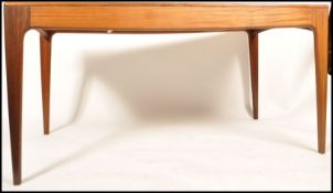 Youngers - A 1970's retro vintage teak wood extending table having the overlapping leg join and