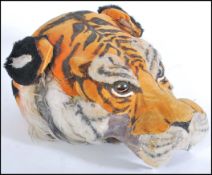 A 20th Century theatre / stage costume of a tiger head being handmade with foam , faux fur and other