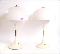 After Verner Panton - Panthella - A 1970's vintage pair of tall white plastic formed lamps having