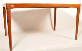Bramin - A mid 20th Century Danish teak wood extending dining table having the fold out leaf and