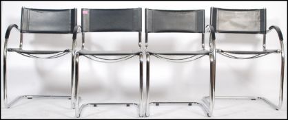A set of four stacking 20th Century vintage Italian tubular chrome cantilever chairs. Two having