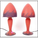 After Emile Galle - A pair of Art Nouveau style glass desk / table lamps in a matt crimson red and