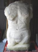 A large abstract carved Bath stone sculpture of an older ladies torso on a square plinth form.