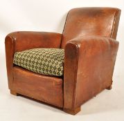 A 1930's Art Deco French club chair / armchair. Full grain original leather being stuffed and sprung