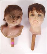 A rare pair of 19th Century shop display advertising point of sale wax children's heads with faux