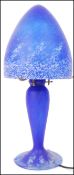 After Emile Galle - An Art Nouveau style glass desk / table lamps in a matt navy blue and dark
