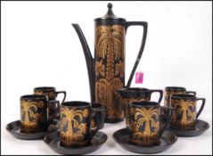 A retro mid century believed Portmeirion coffee service comprising coffee pot, coffee cans and