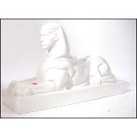 Royal Sphinx - A Vintage antique Circa 1920 Dutch statue of a porcelain ceramic sphinx in white with