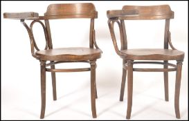 A pair of early 20th century Thonet bentwood cafe - students lecture chairs. Each with turned legs