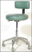 A 20th century Industrial medical theatre swivel - office chair. The stainless steel 5 point base