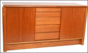 Skovby - A retro vintage Danish teak wood sideboard having an arrangement of drawers and shelved