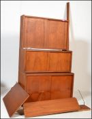 PS System - A mid Century Danish retro vintage modular teak wood shelving and storage system. The
