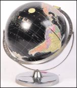 Encyclopedia Britanica Inc - Reploge Globes - A 1960's retro vintage globe with black seas on chrome