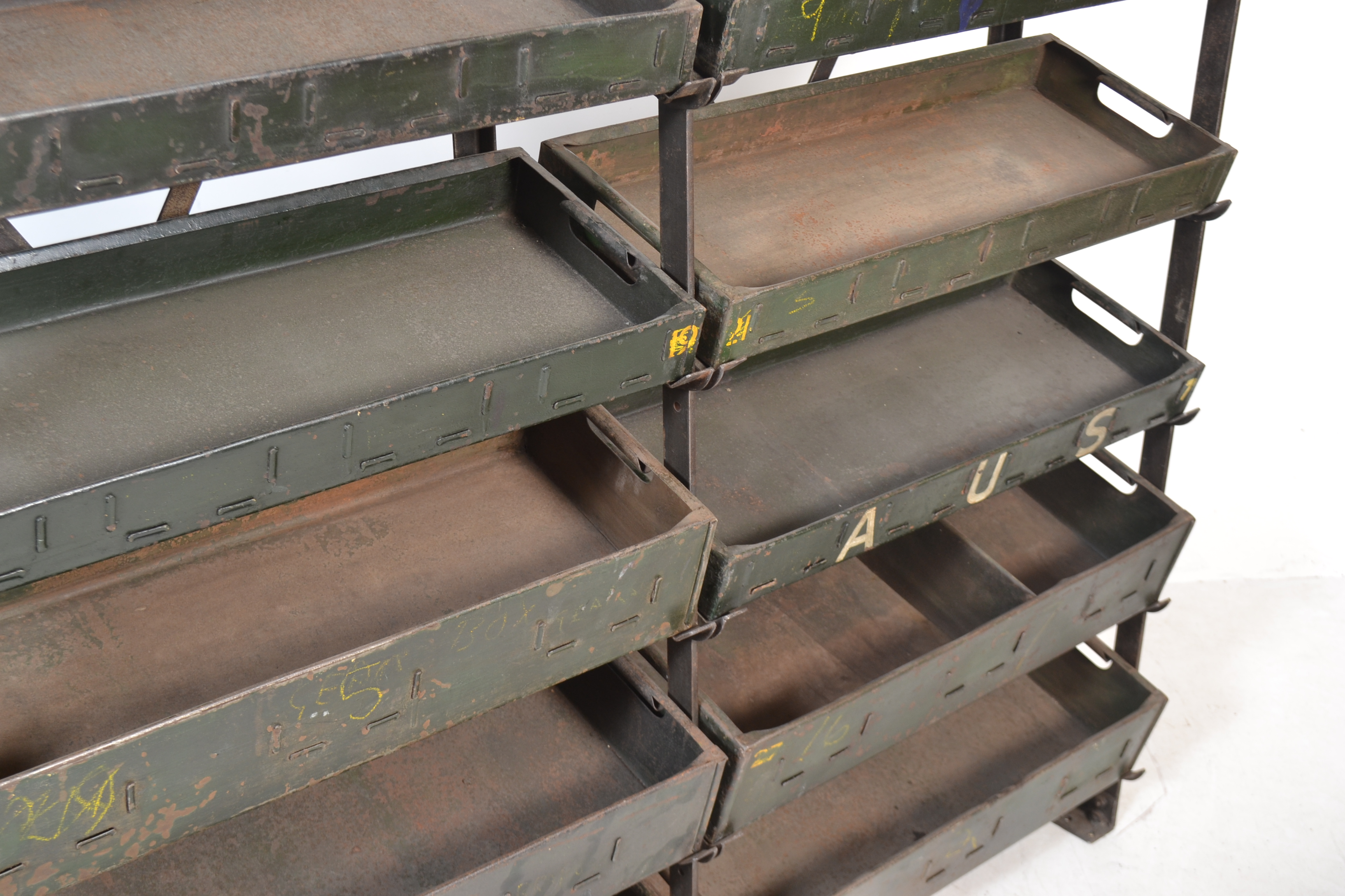 A vintage industrial metal storage rack unit having a ' x ' frame support and 12x angled slopes - Image 3 of 5