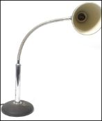 A vintage retro 20th century gooseneck goose neck anglepoise lamp raised on a heavy cast black