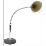 A vintage retro 20th century gooseneck goose neck anglepoise lamp raised on a heavy cast black
