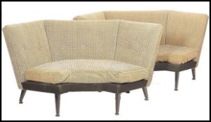A pair of retro mid century booth style sofa settee's being upholstered in the original two tone