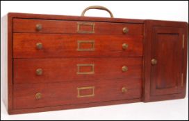 An early 20th Century vintage industrial mahogany carpenters / engineers toolbox / specimen chest