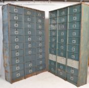 A pair of  large Industrial mid century 30 section fall front filing cabinet of metal construction