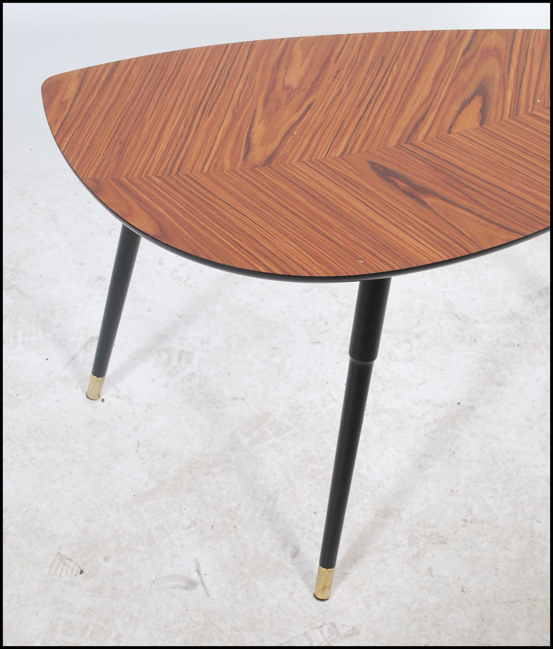 A vintage retro 20th century low tripod table having a leaf pattern top. The table raised on - Image 4 of 4