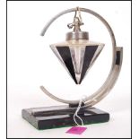 An unusual 1930's art deco shop display point of sale advertising faceted diamond perfume scent