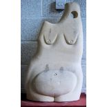 A large abstract carved Bath stone sculpture of a pregnant woman, the reverse having an exposed