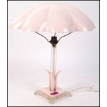 An Art Deco antique vintage table lamp having a large parachute type shade supported by a square