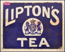 An early 20th century Lipton's Tea enamel advertising sign. Blue and white colourway with armorial