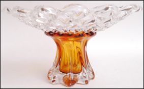 A 20th Century retro vintage style Scandinavian studio art heavy weighted shaped amber flute glass