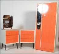 An original 1950's retro vintage white painted and burnt orange Formica wood patterned bedroom