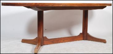 A Robert Heritage for Archie Shine  mid-20th century large oval extending dining table being