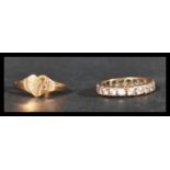 A 9ct gold and white stone eternity ring together