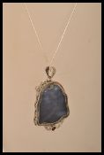 A sterling silver and rock crystal necklace pendan