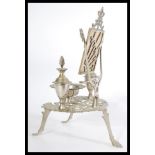 An apprentice piece silver plated dressing table i