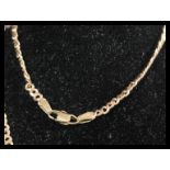 A hallmarked 9ct gold curb chain necklace having a