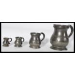 A set of four 18/19th century graduating pewter me