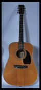 Two 20th Century acoustic six string guitars to in