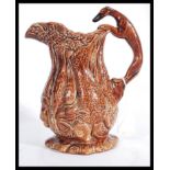 A 19th century Victorian relief jug depicting game