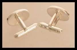 A pair of sterling silver Welsh Claddagh cuff link