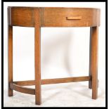 A 1930's Art Deco oak console hall table of demi -
