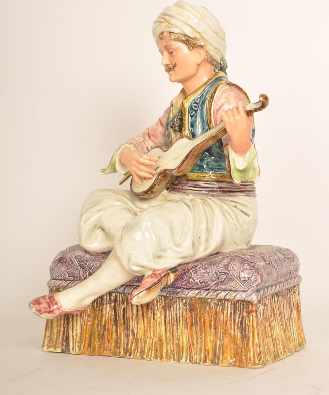 A 19th century Capodimonte Majolica figurine of a - Image 2 of 6