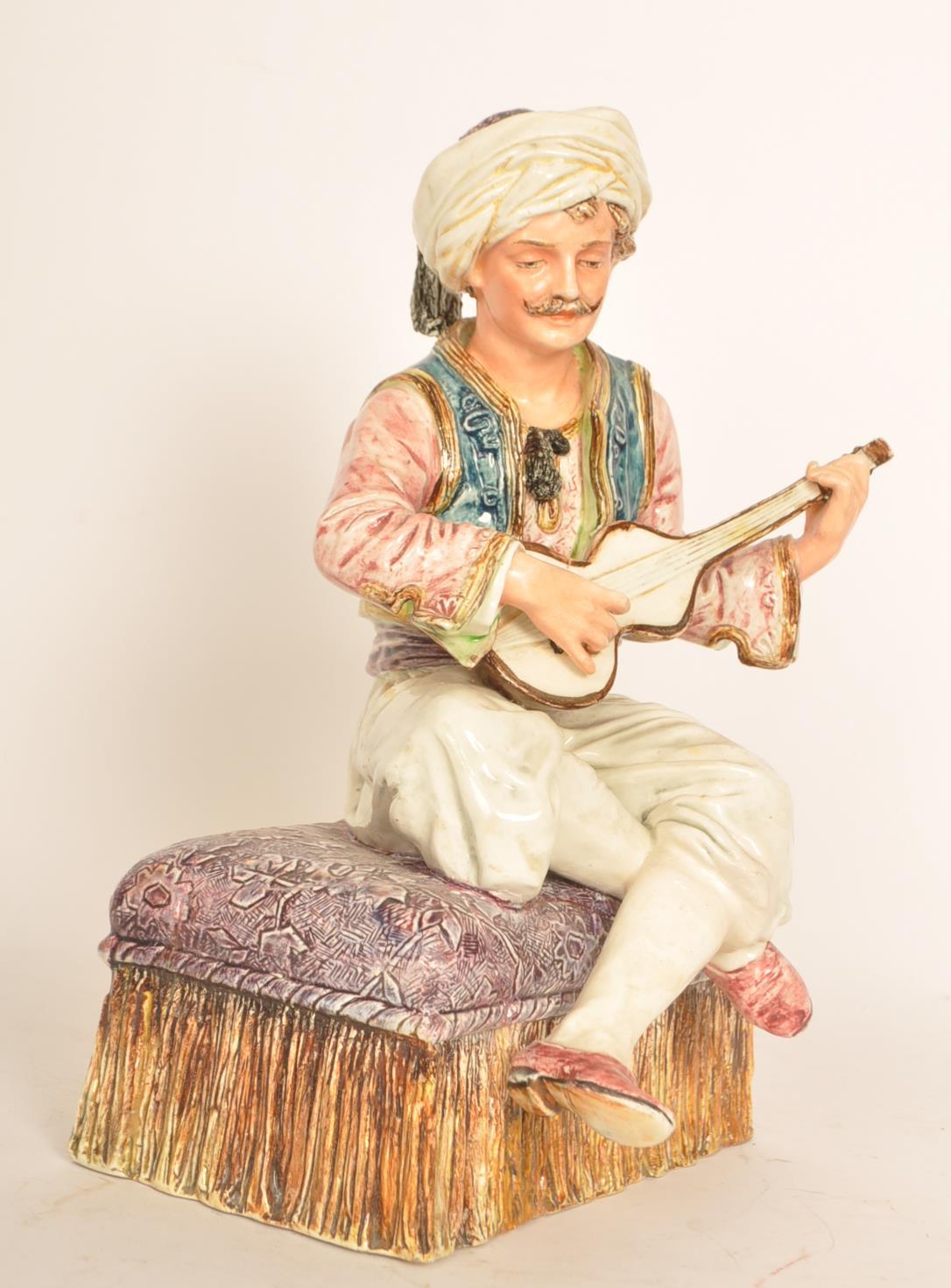 A 19th century Capodimonte Majolica figurine of a