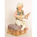 A 19th century Capodimonte Majolica figurine of a