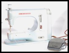 A vintage retro 20th century Fridor sewing machine