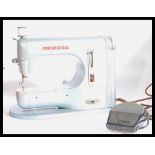 A vintage retro 20th century Fridor sewing machine