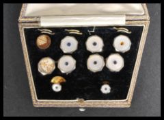 A cased set of dress cufflinks and studs,  each mo