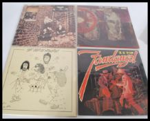 A collection of long play LP vinyl records featuri