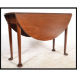 A 19th century Georgian mahogany drop leaf dining