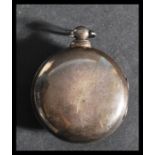 A silver hallmarked open faced pocket watch, fitte