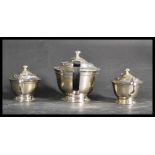 An early 20th century silver plated three piece ge